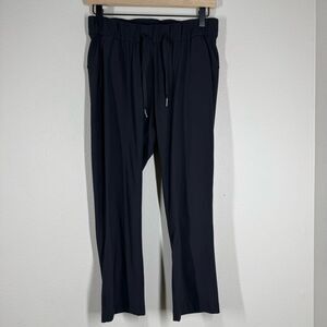 Lululemon On The Fly Crop 23" Black Size 4 Drawstring Pocket Travel W6AV6S